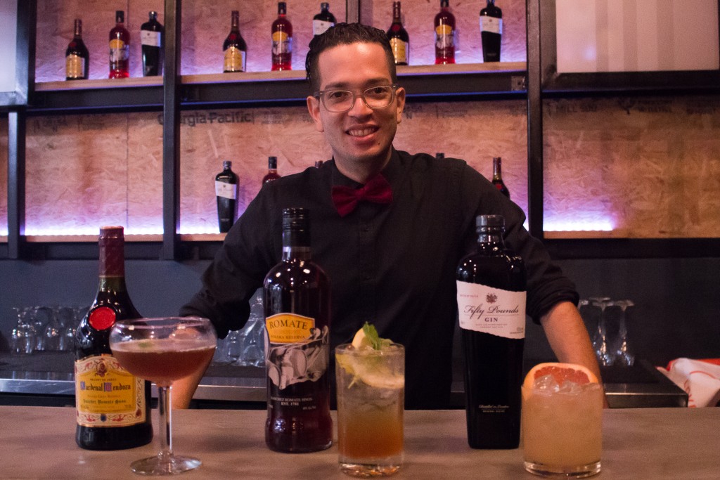 Mixologist Arnaldo Silva at a bar with Cardenal Mendoza and other spirits from Sánchez Romate.
